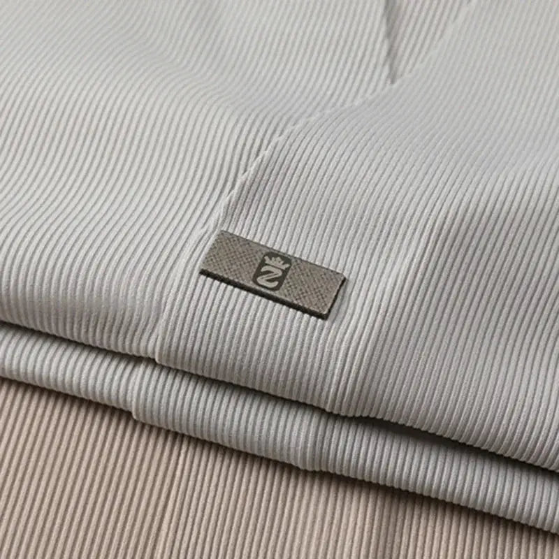 Men's short-sleeve polo shirt in light gray ribbed knit with Simples Market label.