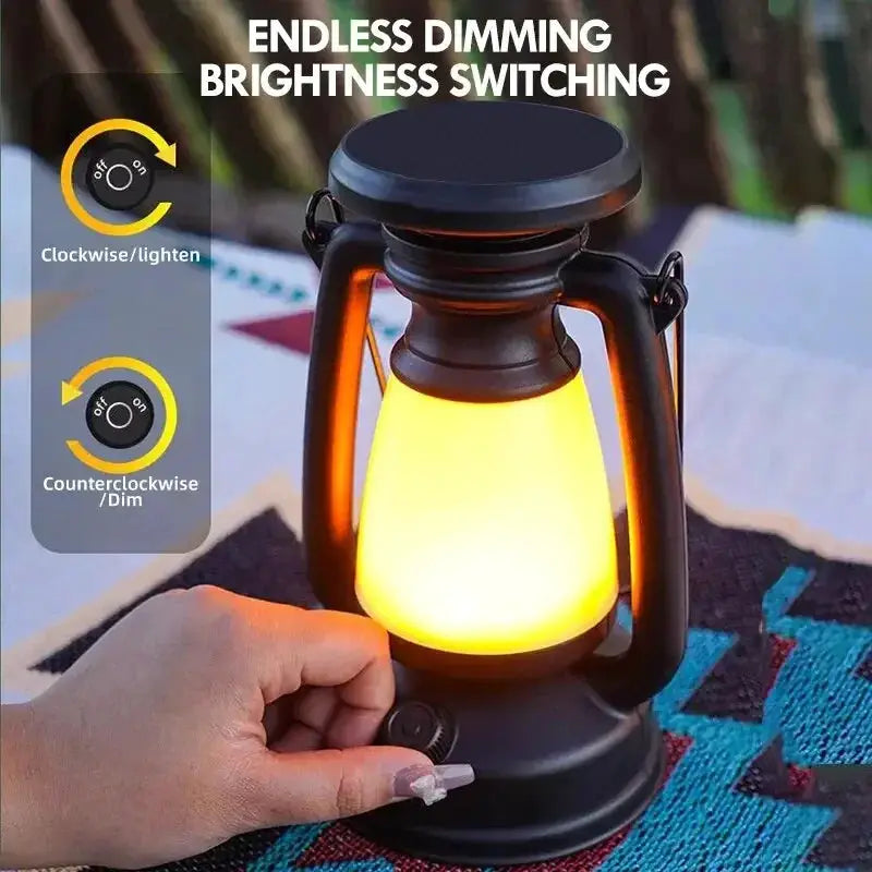 LED lantern lamp in black metal with warm yellow glow, suitable for camping, bar or home decor.