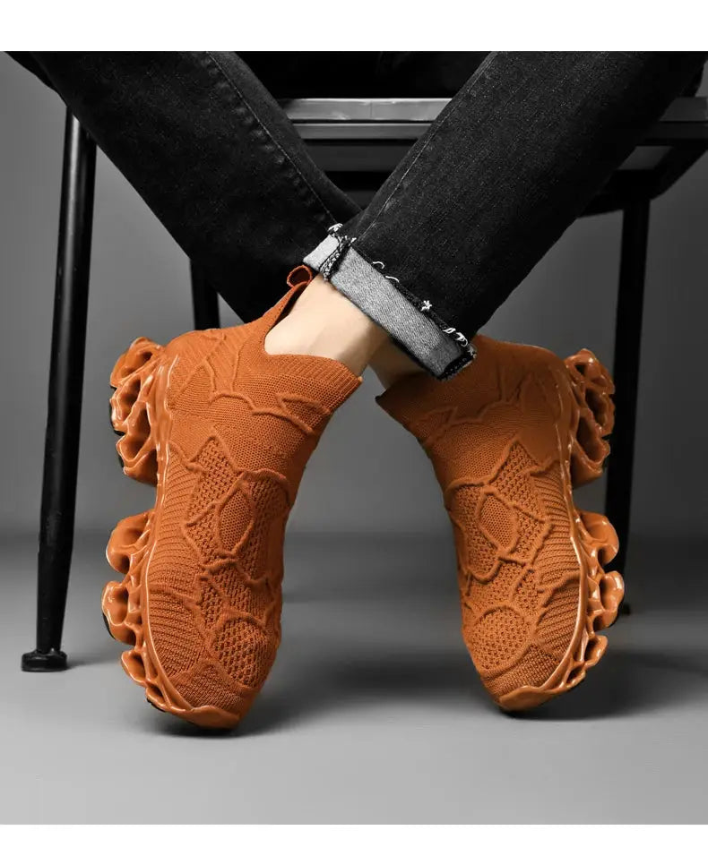 Men's orange knitted sneakers with a bubble outsole for casual running style