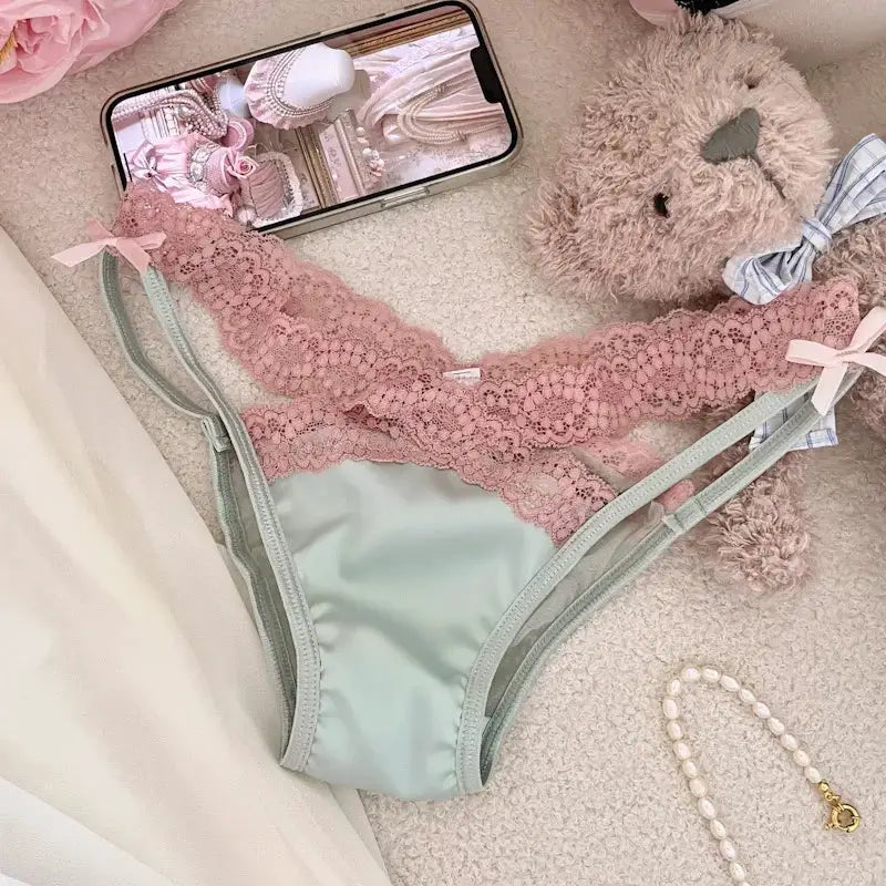 Women's lace and satin panties with pink floral lace waistband, mint satin front panel, side bows