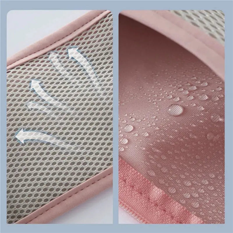 Waist pack for running, pink-lined interior with waterproof storage and breathable gray mesh exterior