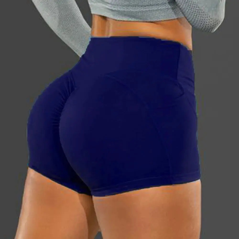 High-waist hip-lifting seamless knitted fitness shorts by Simples Market in navy blue, elastic for running.