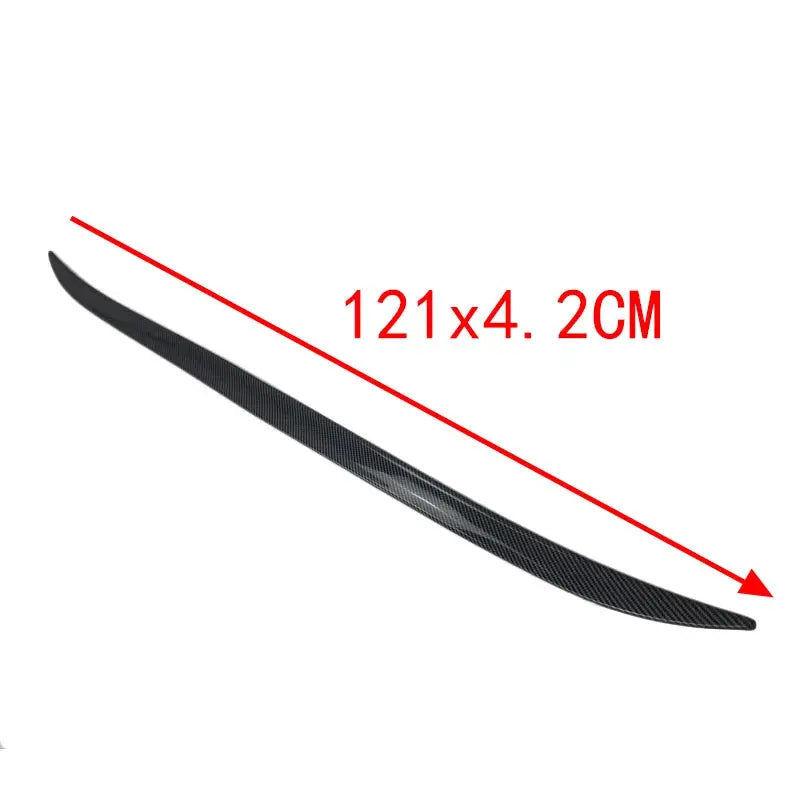 Simples Market carbon fiber-look rear spoiler lip for VW Passat B6/B7/B8, black soft plastic, 121x4.2 cm