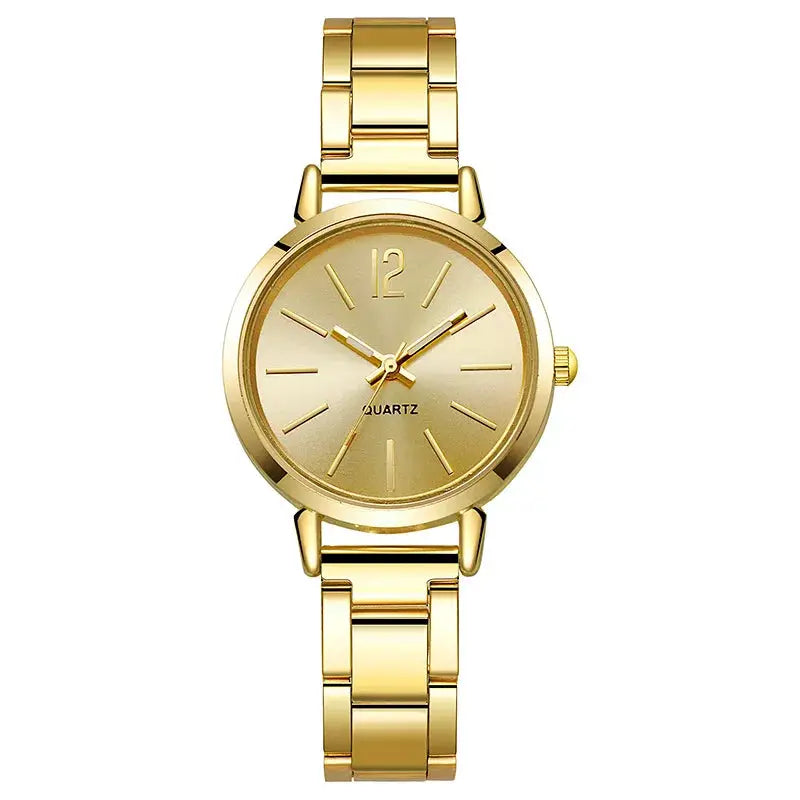 Gold-toned women's bracelet wristwatch with simple dial and quartz movement