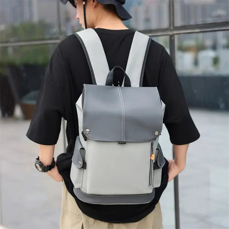 USB Charging Urban Man Backpack, grey two-tone waterproof rucksack with laptop compartment.