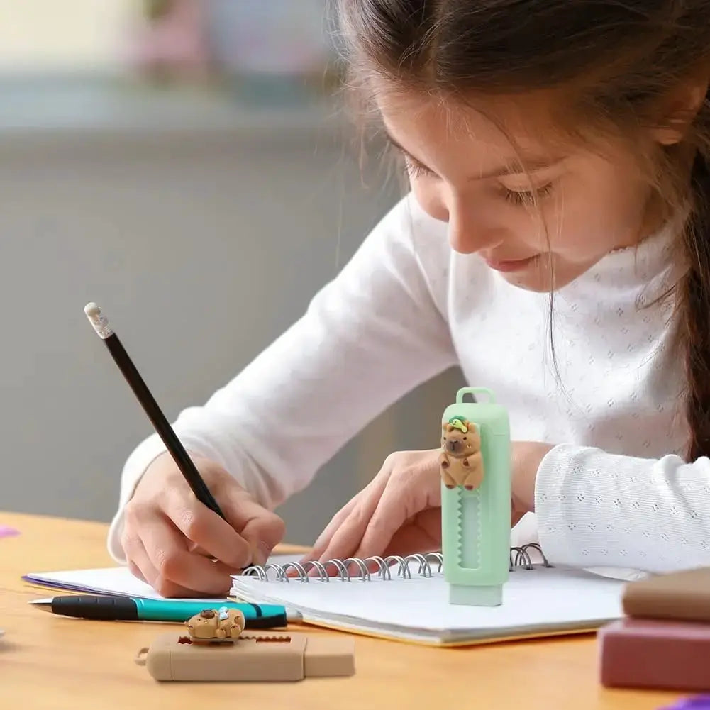 4-piece Capybara erasers set by Simples Market in pastel-green retractable holder with cute capybara designs