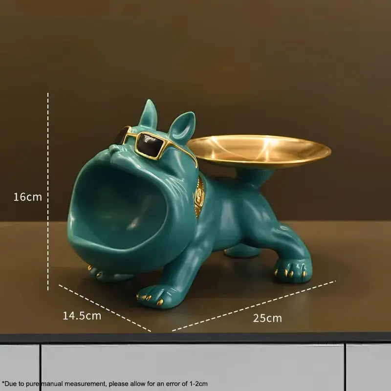 Resin bulldog statue with storage tray on its back, teal finish, gold accents, and sunglasses.