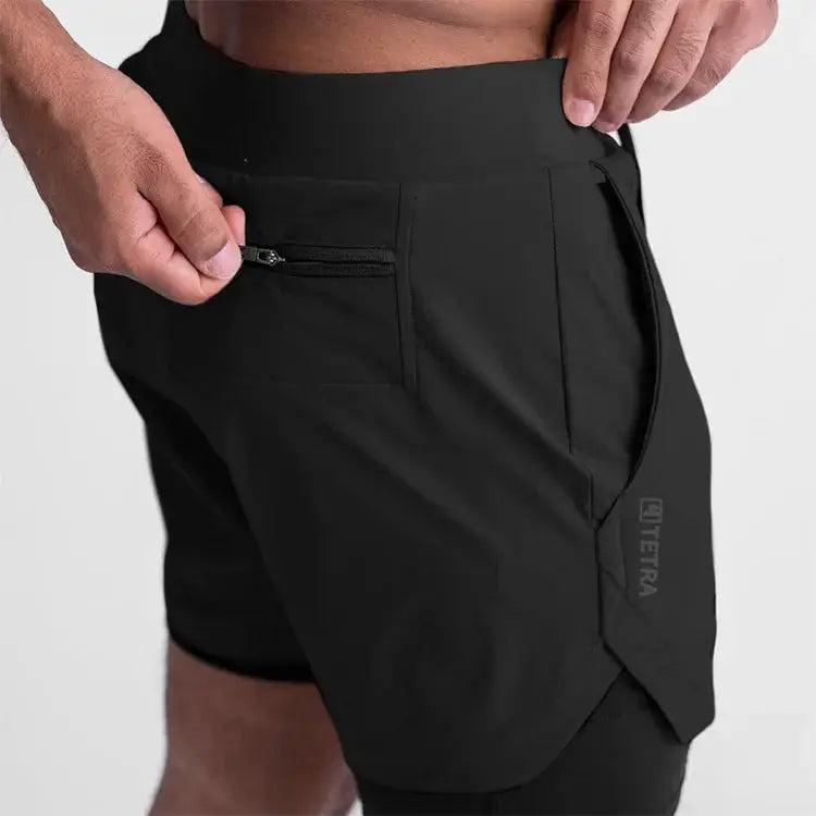 ASRV Quick Dry 2-in-1 shorts, black with zip pocket and curved hem.