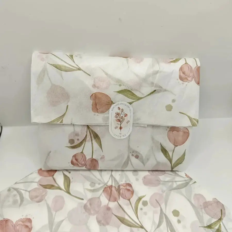 Tissue paper featuring tulip floral pattern with green leaves for gift wrapping by Simples Market