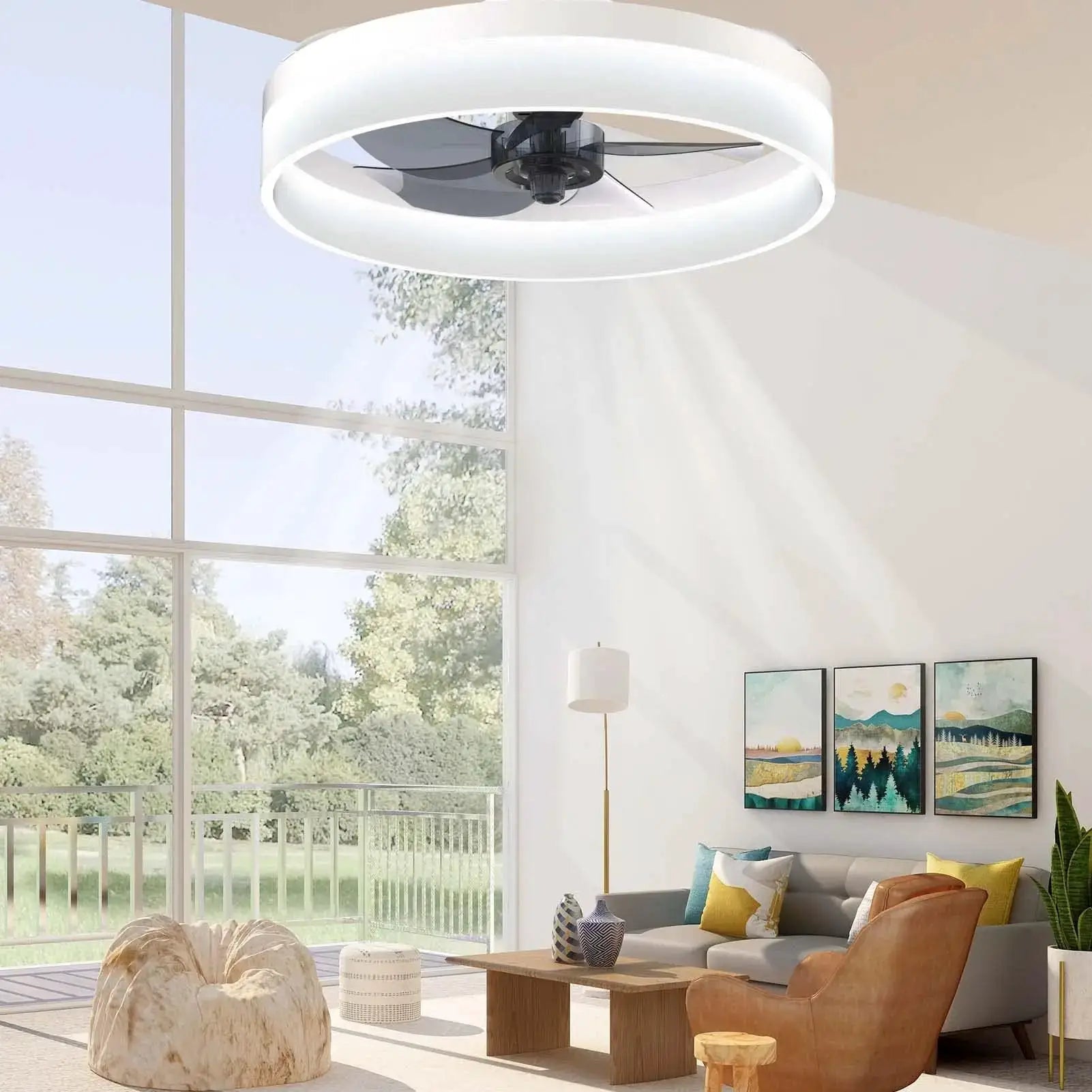 Ceiling fan with circular LED light ring, white finish, remote control in a modern living room.
