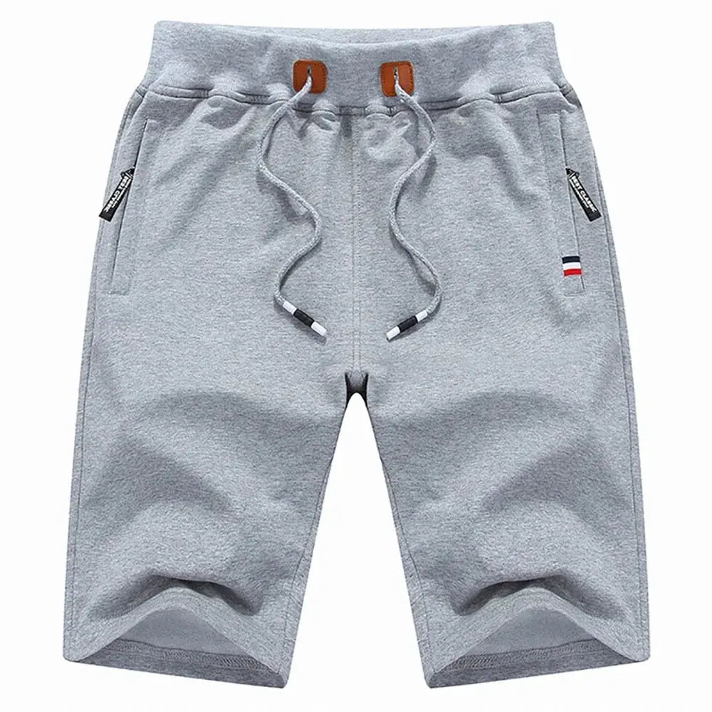 Men's light gray cotton jogger shorts with drawstring and side pockets