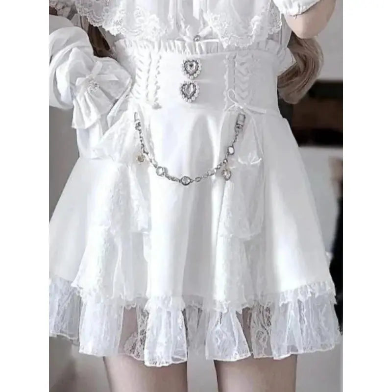 Lolita blouse by Simples Market in white with lace, off-shoulder styling, waist chain, and lace-trimmed hem