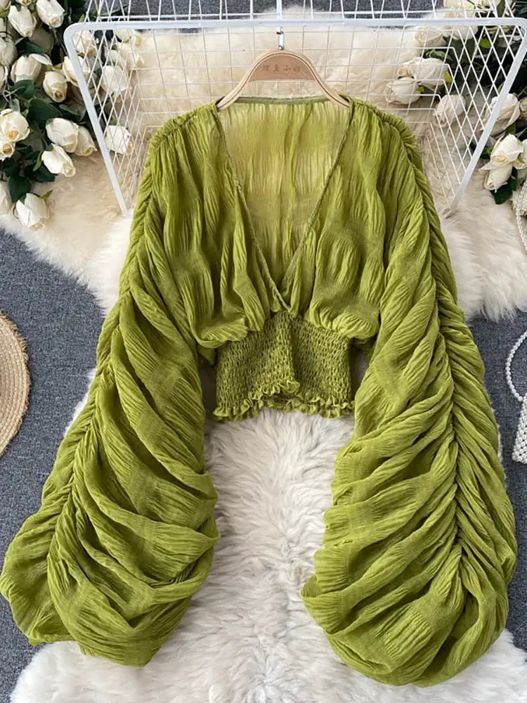 Draped chiffon blouse for women in olive green with puff sleeves and smocked waist