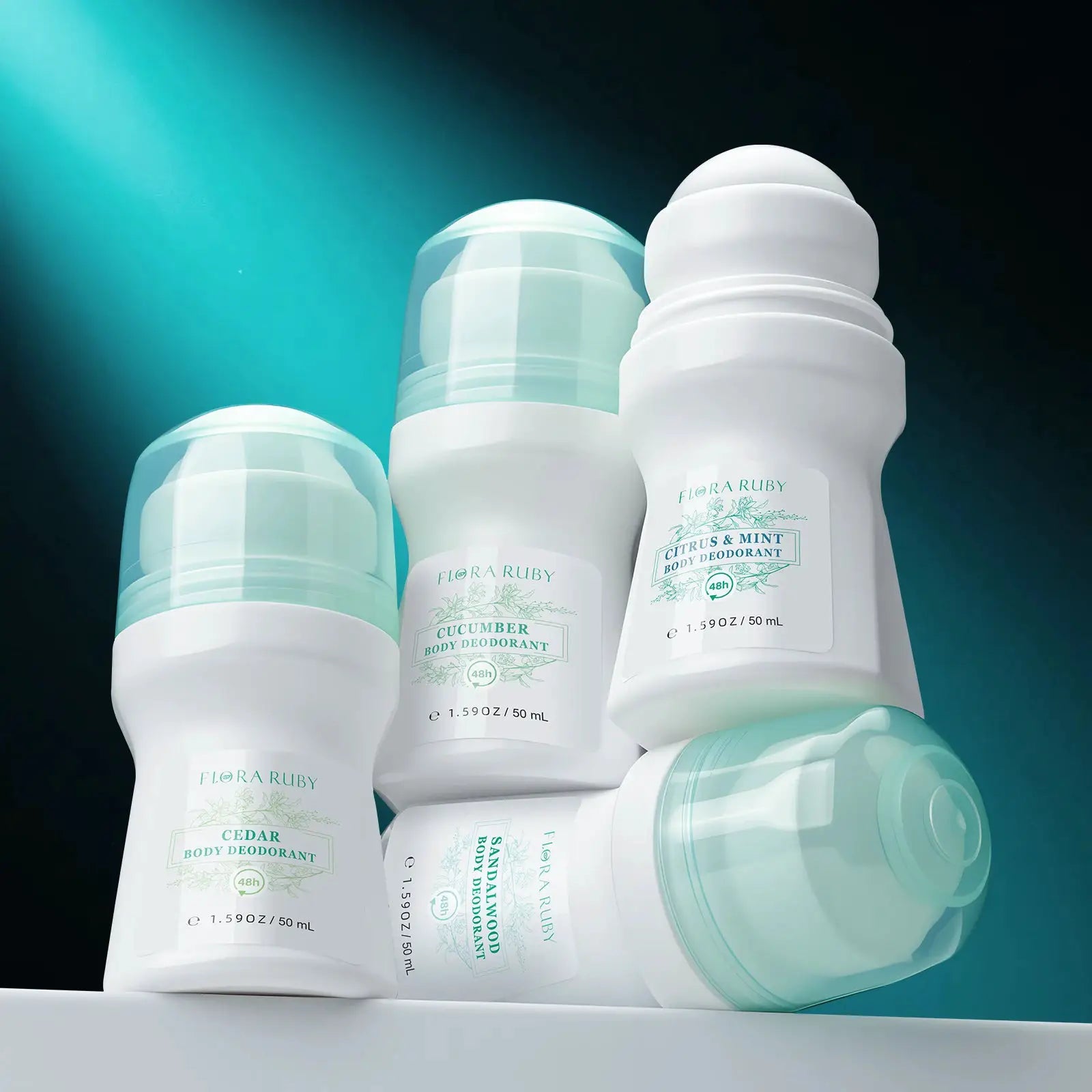 Flora Ruby body deodorant roll-ons; white bottles with light-green labels, aluminum-free, multiple scents