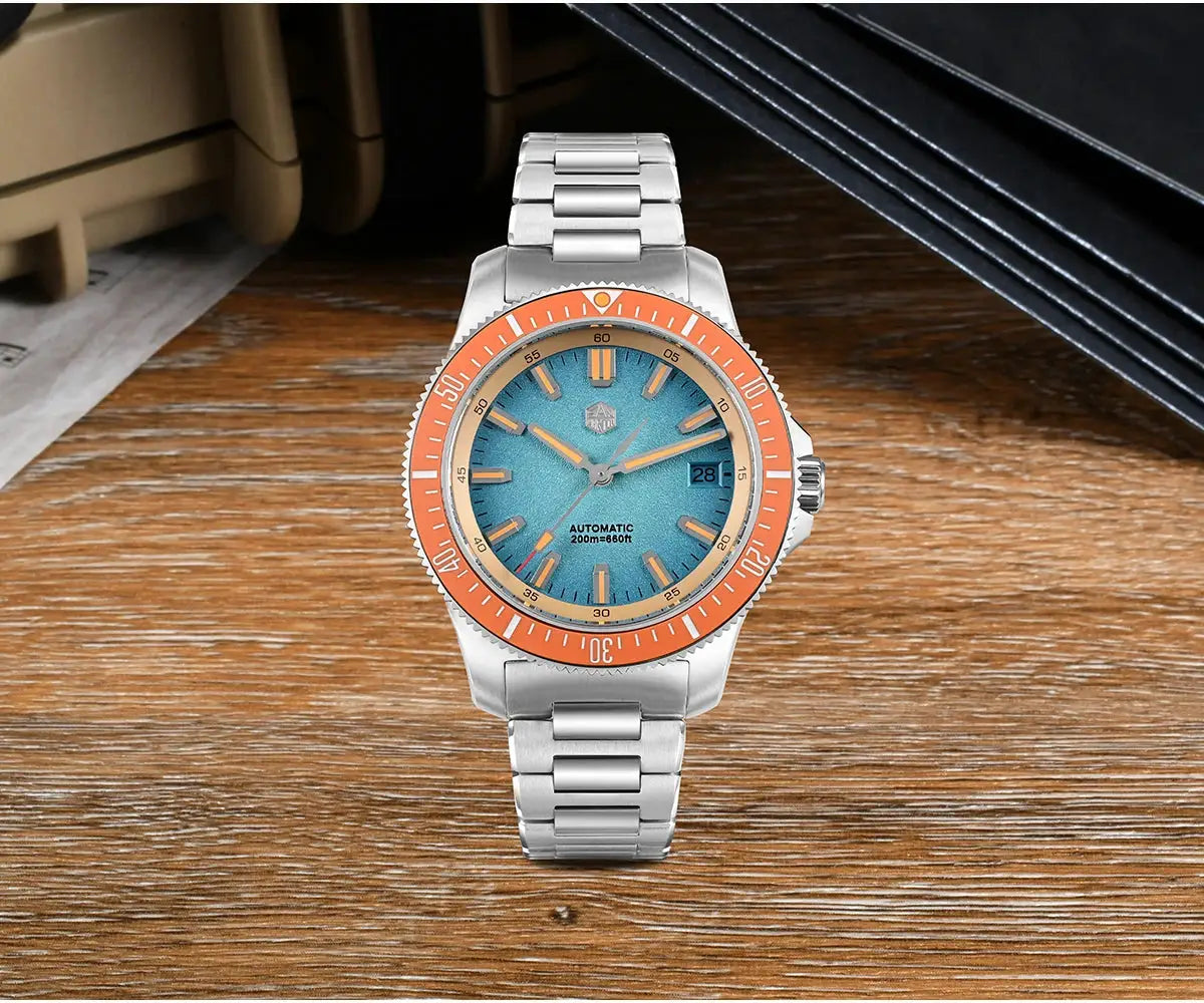 San Martin 40mm diver watch with blue dial, orange bezel, 200m water resistance, stainless steel bracelet.