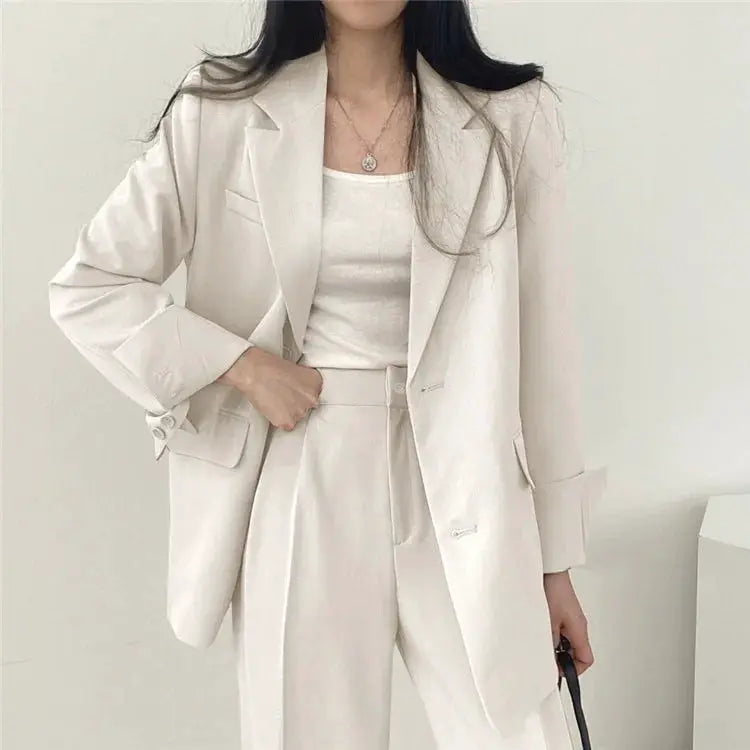 Beige women's long-sleeve blazer and matching pants 2-piece suit by Simples Market