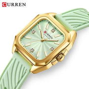 Curren 9113 stylish ladies' quartz watch with gold-tone square case, mint dial, light-green strap