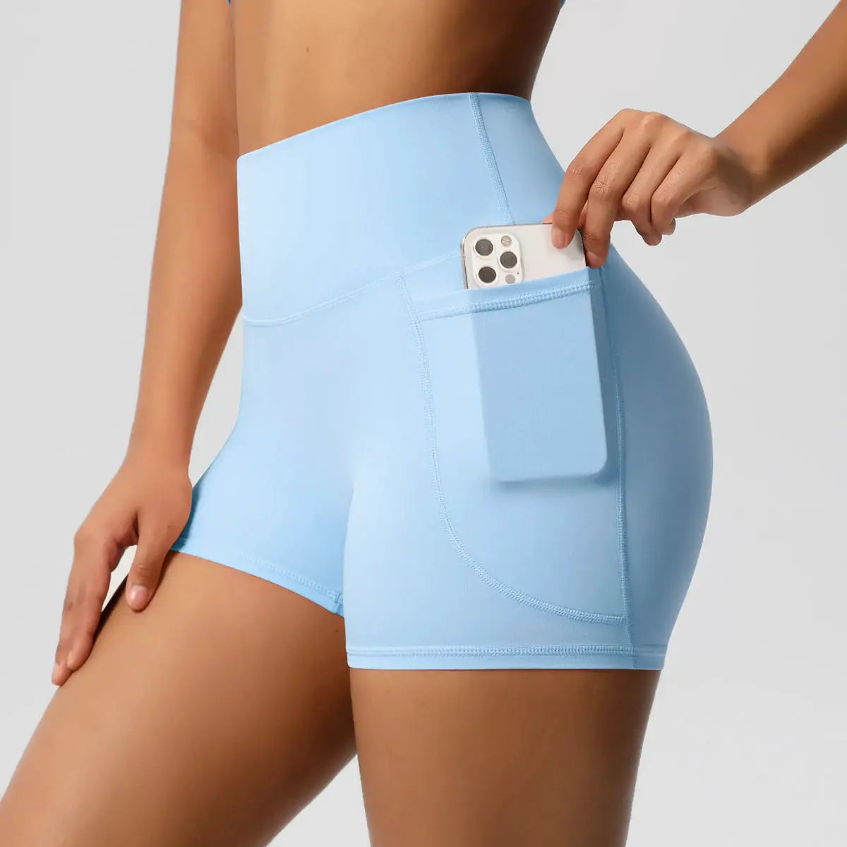 Women’s light blue high-waist athletic shorts with side pocket