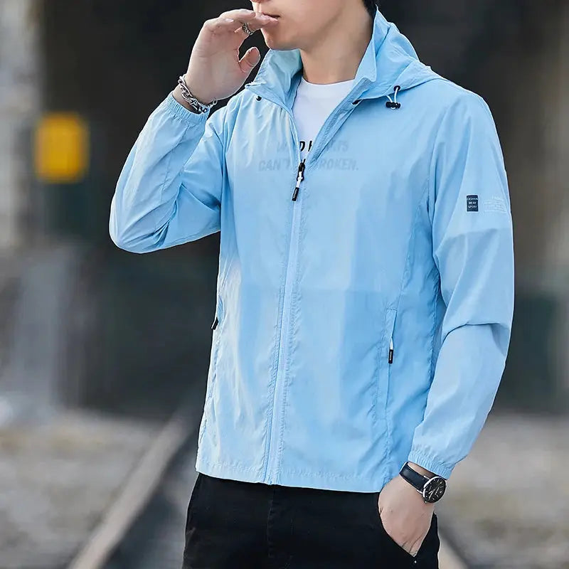 Windbreaker jacket by Simples Market, light blue, lightweight breathable UV-protection outerwear with hood.