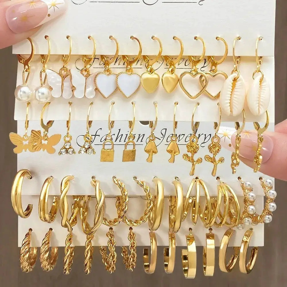 European And American Metal Earrings 24 Piece Set Featuring Pearls Mushrooms Snakes Butterflies And More Fashion Jewelry