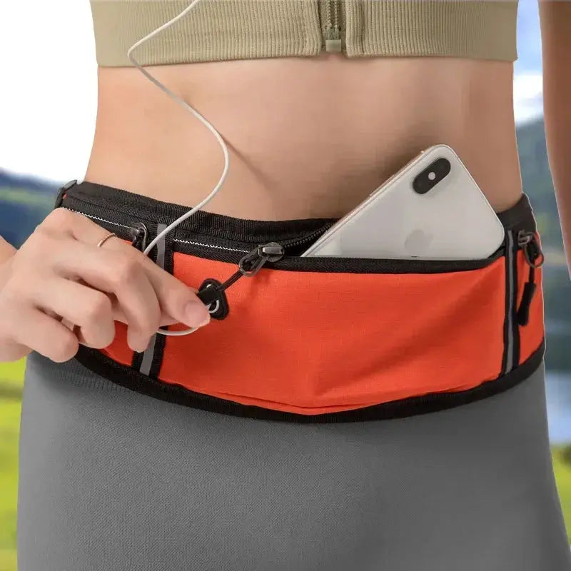 Casual waist pack waterproof sport bag with orange front pocket, holding a smartphone