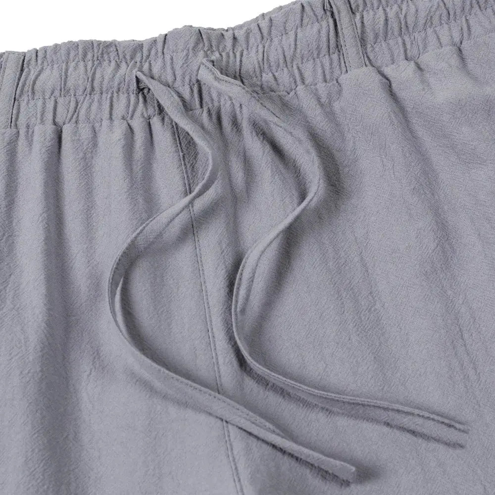 Simples Market men's grey cotton-linen trousers with drawstring waist, loose straight fit.