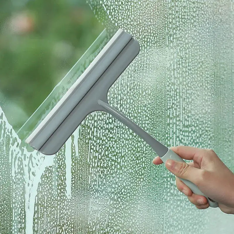 Silicone scraper wiper by Simples Market; gray, multi-surface cleaner for windows, glass doors, and countertops.