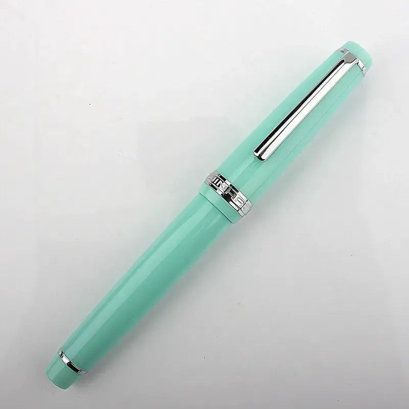 Jinhao 82 fountain pen in mint green acrylic with silver trim and clip