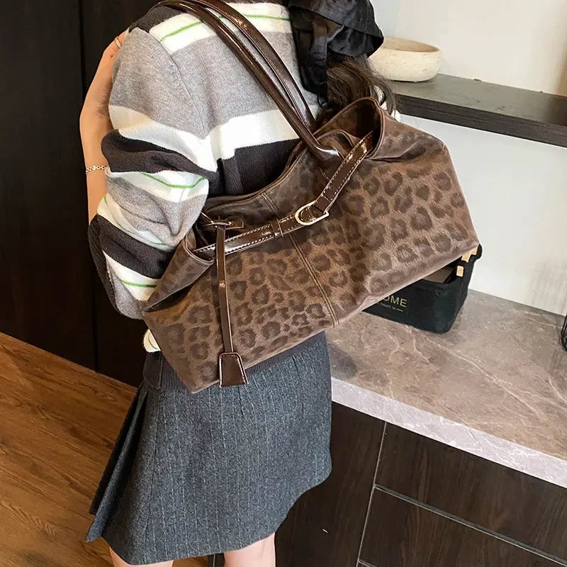 Leopard print PU leather shoulder bag with brown top handles and removable crossbody strap