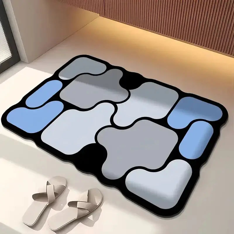Special-shaped bathroom diatom mud floor mat with blue-gray and light gray patches, black border.