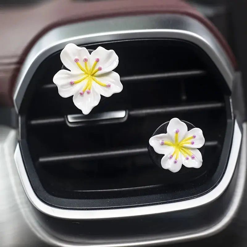 Simples Market 2-piece flower car perfume clip for air vent; white petals with yellow centers