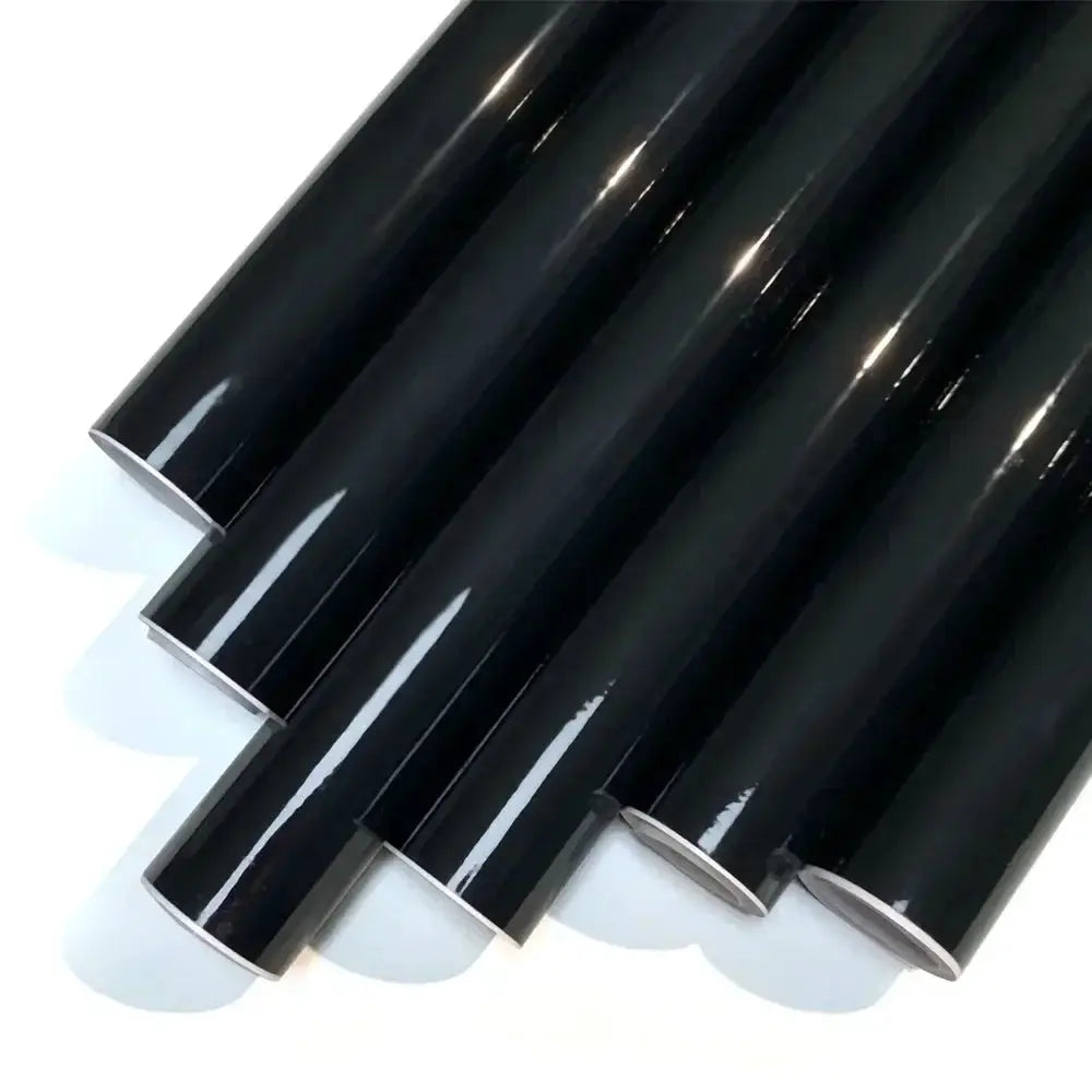 Five glossy black carbon fiber wrap vinyl rolls for car and motorcycle decals, waterproof