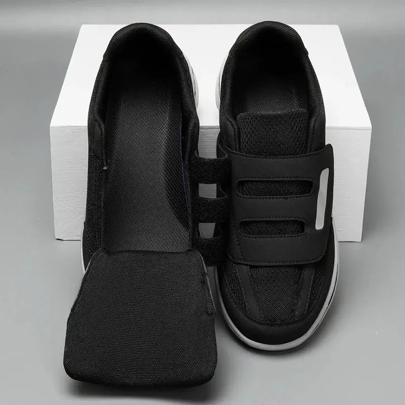 Wide-toe orthopedic sneakers pair in black by Simples Market with Velcro straps