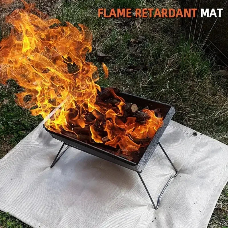 Flame-retardant fiberglass camping mat by Simples Market under an outdoor fire pit.
