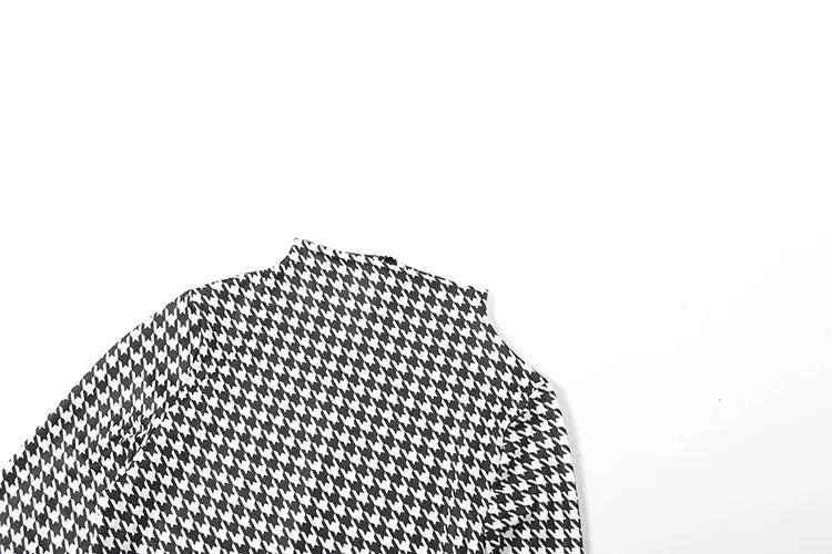 Jumpsuit by Simples Market in black and white houndstooth with turtleneck long sleeves