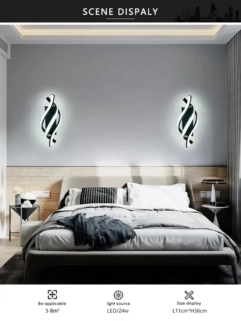 Curved spiral LED wall lamp pair; black and white sconces on a gray bedroom wall