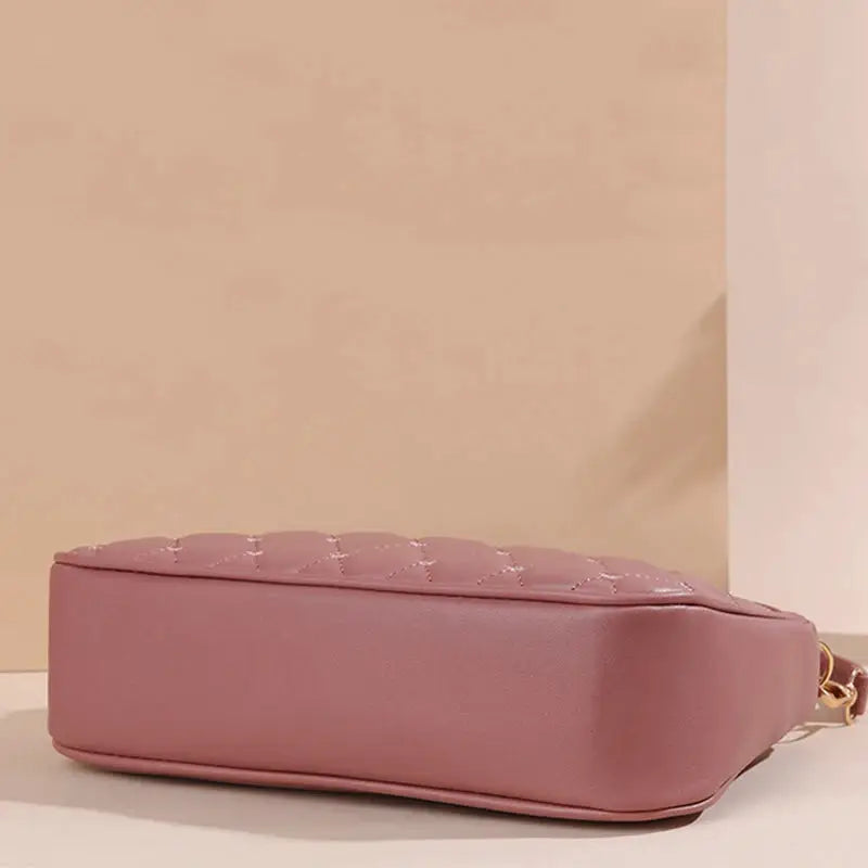 PU leather crossbody bag in pink with quilted top by Simples Market