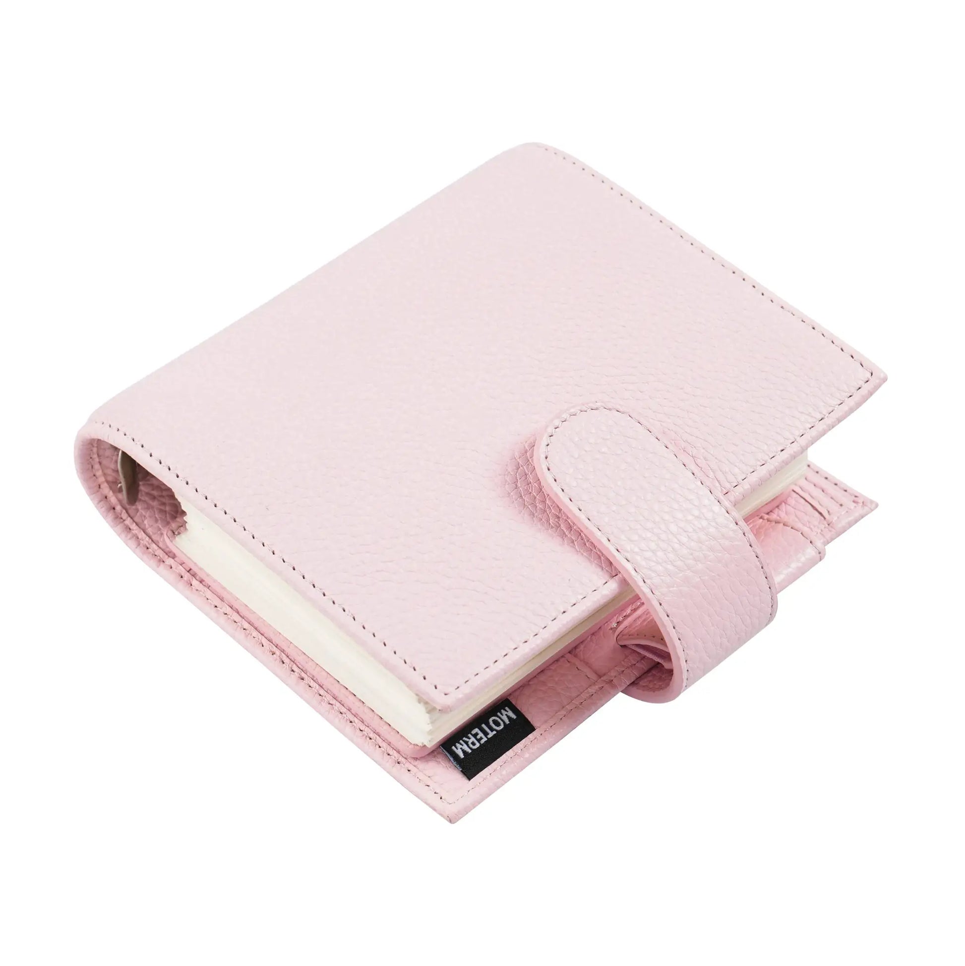 Moterm Luxe 2.0 pocket planner in pink pebbled-grain leather with strap closure and Moterm label