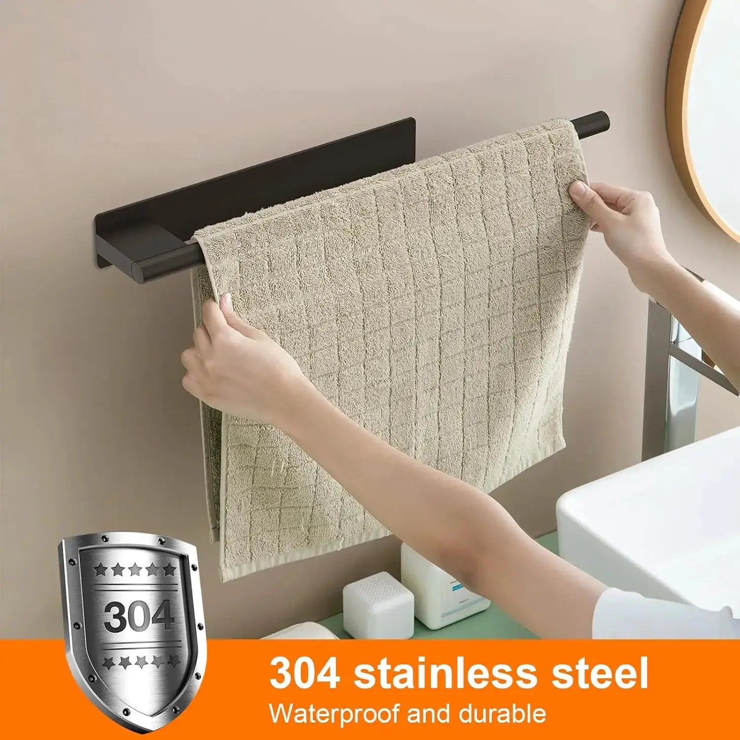 Bathroom towel bar in matte black stainless steel with no-drill adhesive mounting.