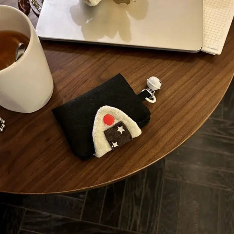 Rice-ball card holder and coin purse in black canvas with white-onigiri patch and zipper pull