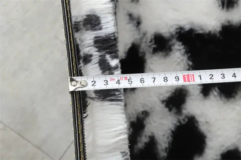 Premium fluffy area rug by Simples Market, black and white cow print, extra soft shaggy living room rug