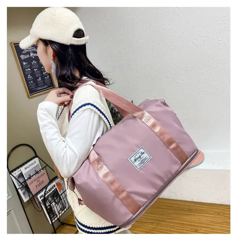 UNIXINU pink nylon carry-on duffle bag with rose-gold straps; large capacity travel tote