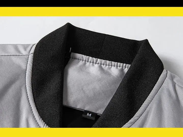 Men's lightweight windbreaker jacket in gray with black ribbed collar