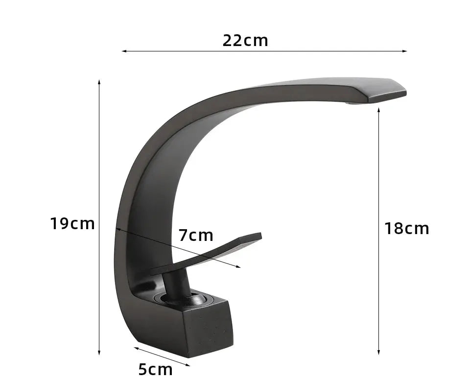 Basin faucet with curved arch, black with gold accents, single-lever waterfall mixer.