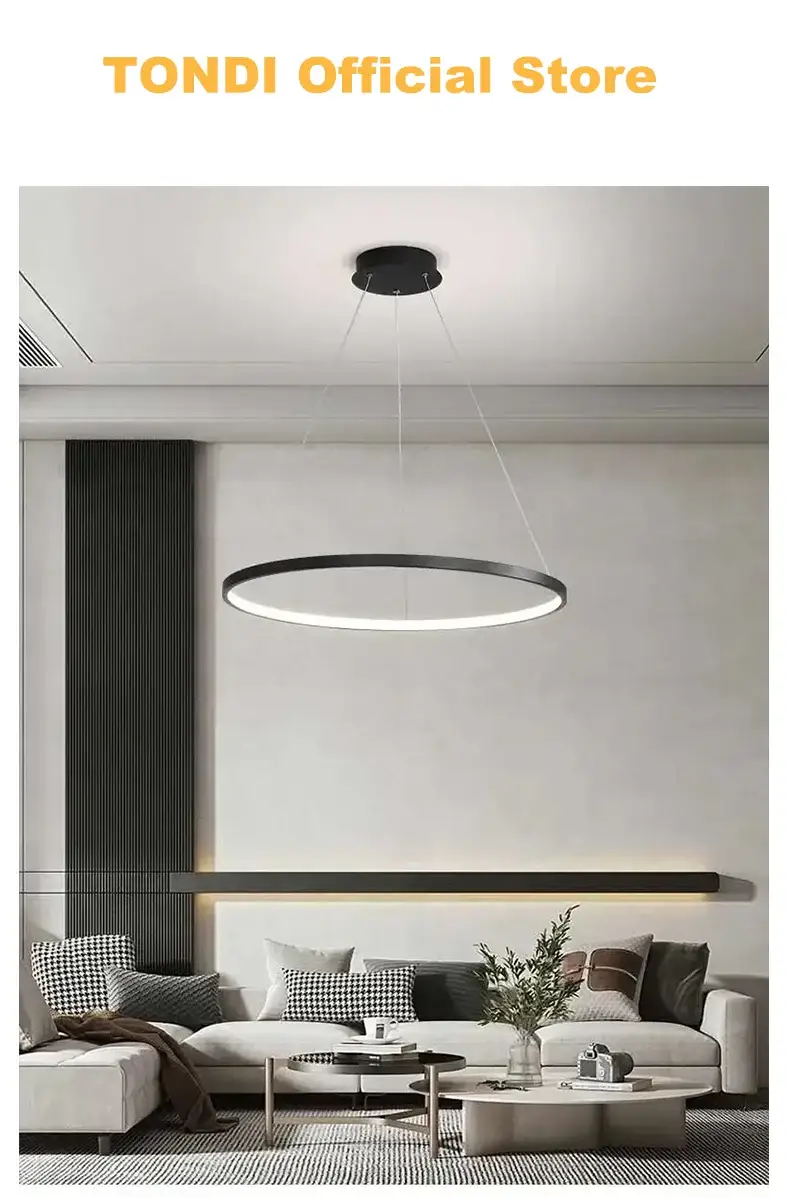 Round LED pendant light ring in black with white glow, ideal for living room or kitchen.