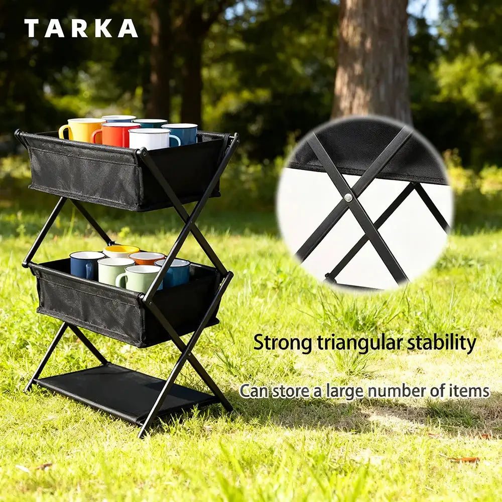 TARKA three-tier folding camping storage rack with black fabric shelves for outdoor barbecue use
