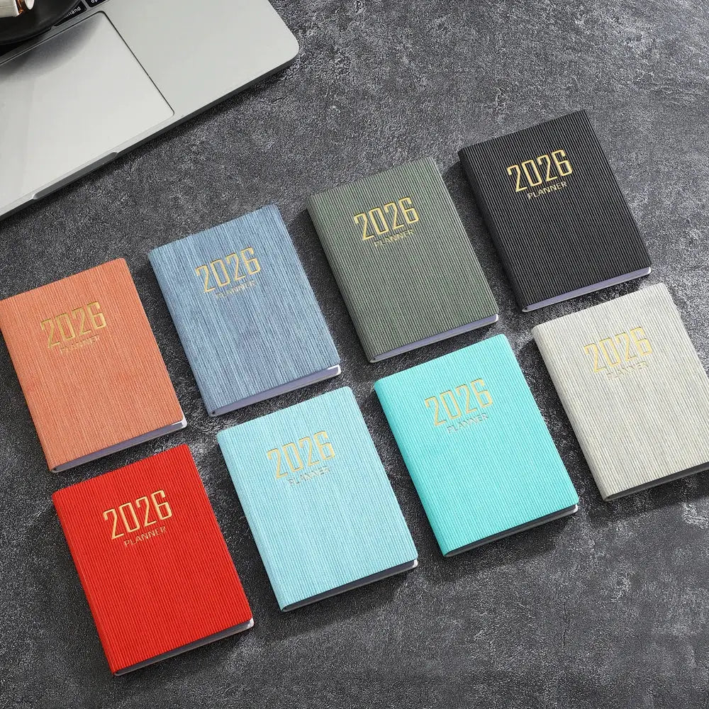 A7 2026 pocket planners set by Simples Market; 9 mini planners in assorted colors.