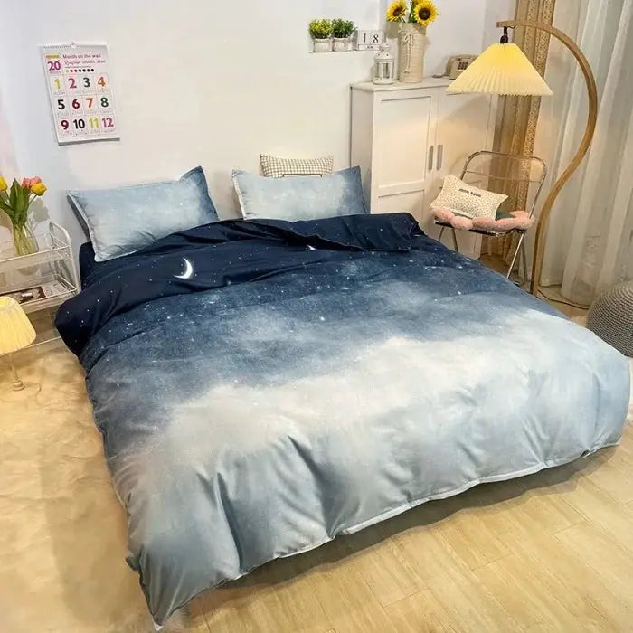 Cotton Aloe Vera four-piece bedding set with gradient blue duvet and crescent moon accent, sky-blue pillowcases