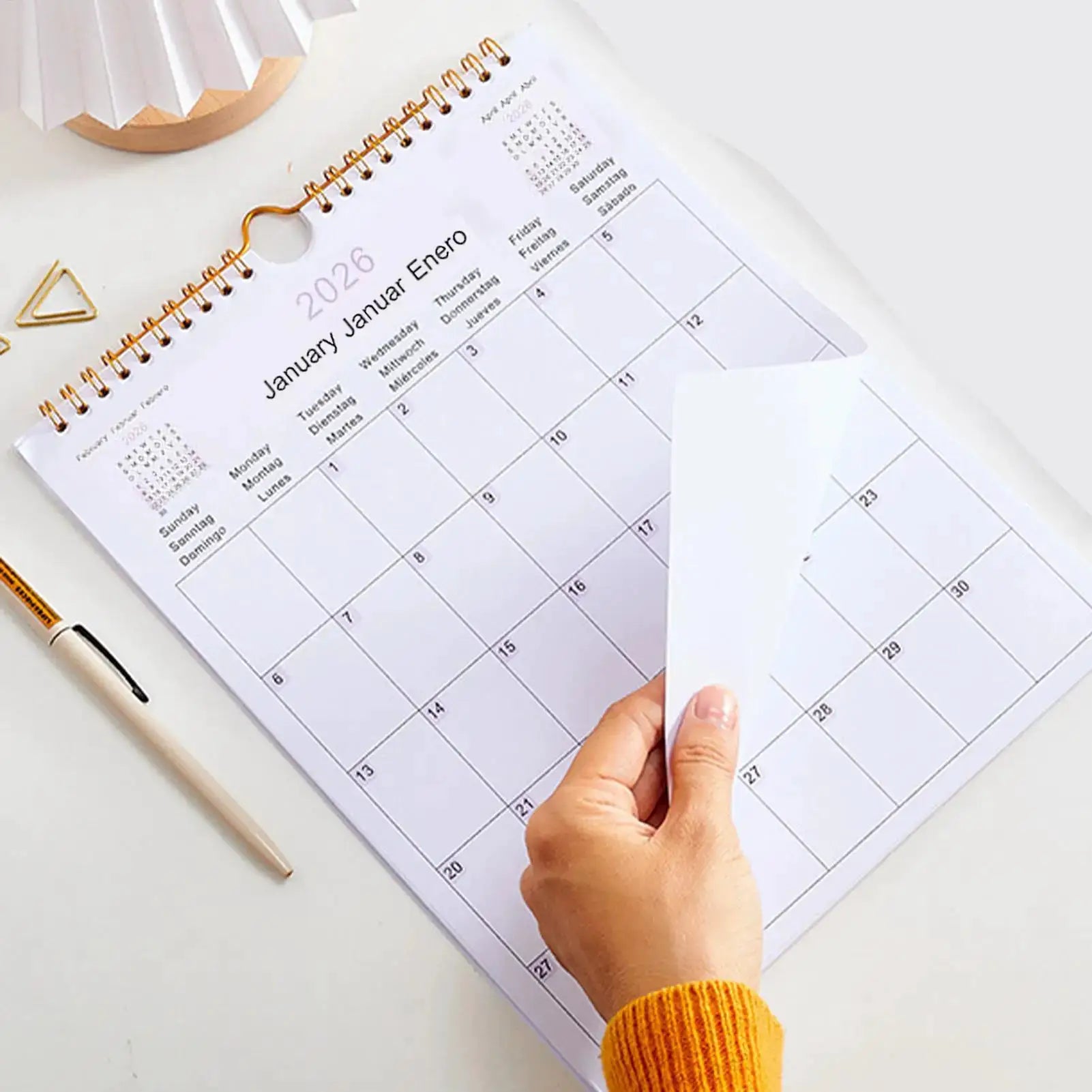 Simples Market 2026 multilingual wall calendar, coil-bound, white with monthly grid