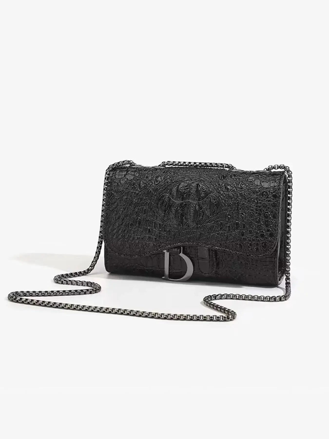 Women's luxury crossbody bag in black crocodile-embossed leather with a metal chain strap